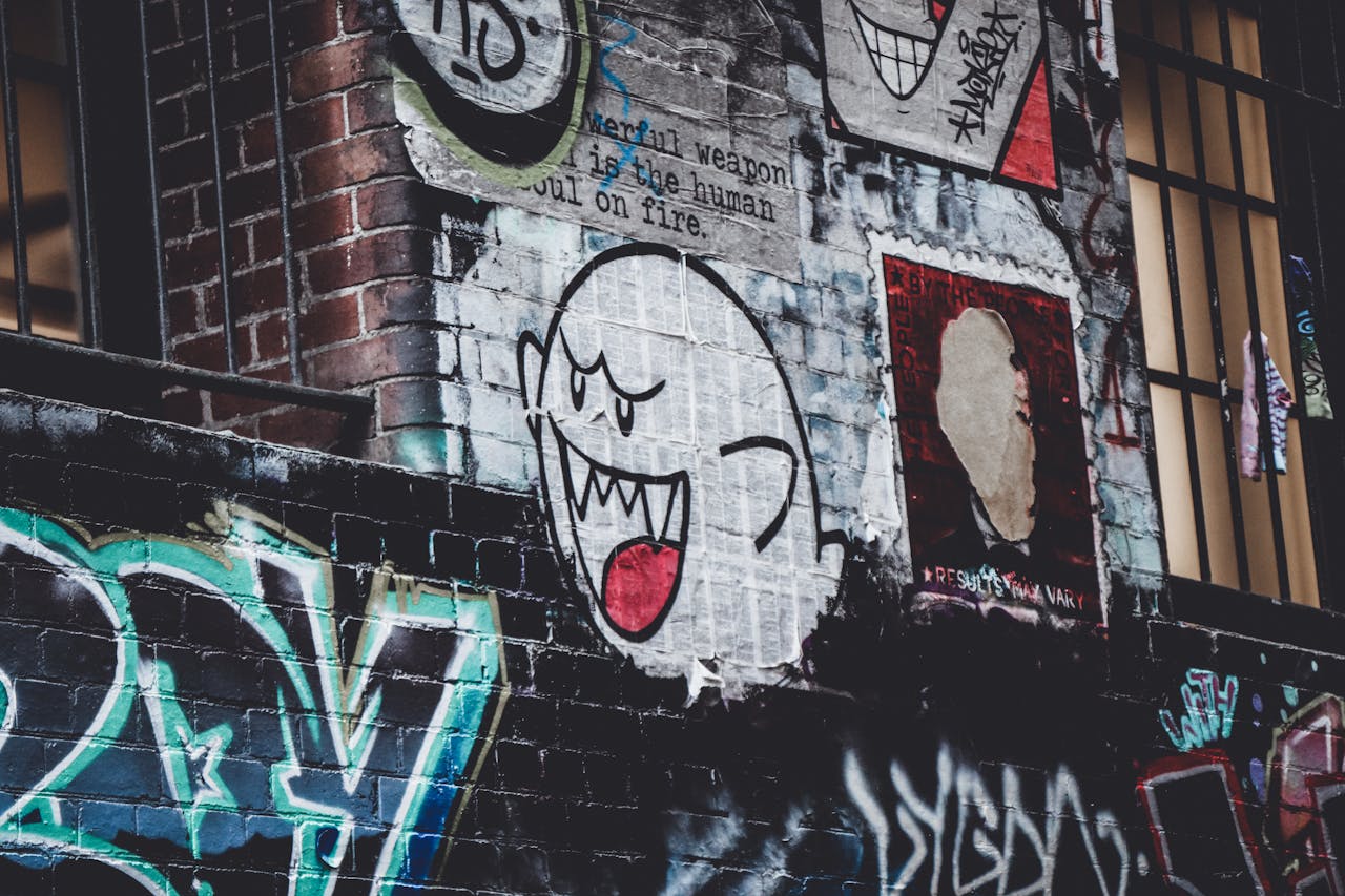 Vibrant street art mural showcasing a cartoon ghost on an urban wall.